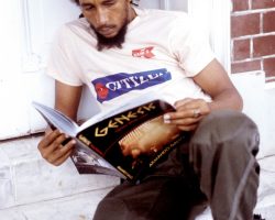 Bob Marley reading my Genesis Book that I just published in the States. On the door step of his house in Hope street, Kingston, Jamaica May 26 1980. This photo became a painted mural on the wall of Trench Town Youth Center. Bob is now inspiring kids to read! Power of a photograph.
