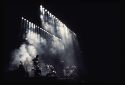 Genesis performing in London Earls Court, June 1977. This is an outake of Seconds Out album cover.